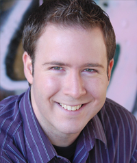 man with brown hair and blue eyes