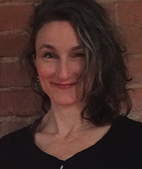 woman with tousled brown hair