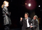 three actors performing an argument scene