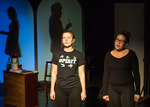 two actors standing side-by-side and looking toward the audience