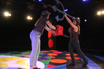 two actors fighting with a chainsaw and trident