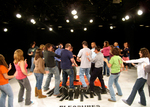 students forming an X