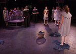 actors dressed in pajamas lined up, two actors dressed as nuns are evaluating the actors