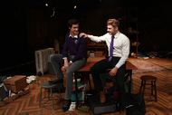 actor consoling another actor with his hand on the other's shoulder