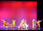 dancers dancing in pairs, one parter is holding the other up