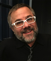 man in white glasses