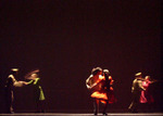 three pairs of dancers dancing on a dark stage